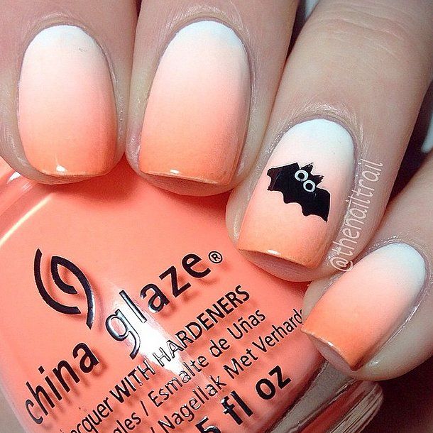 unhas para hallowen usando laranja